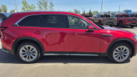 The 2024 Mazda CX-90 GT is a premium, three-row SUV that combines dynamic driving performance with u... (image 5)