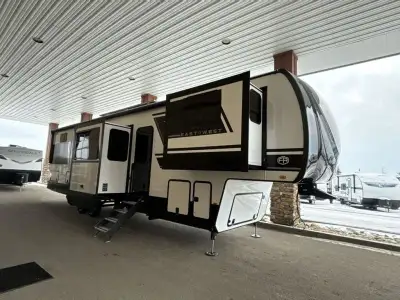 EAST TO WEST Ahara fifth wheel 380FL highlights: Rear Master Bath Kitchen Island with Extensions 24i...