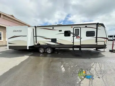 Keystone Sprinter Travel Trailer w/Rear Entertainment Including Slideout Sleeper Sofa w/Bunk Above,...