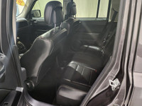 Clean 15 Patriot Sport with all wheel drive, sunroof and more. 2.4 liter engine. Ask about our Lease... (image 5)