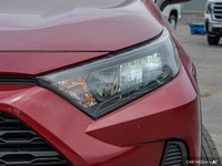 This 2020 Toyota RAV4 LE boasts a stunning Ruby Flare Pearl exterior and a sleek black interior. Its... (image 9)