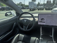 This Tesla Model 3 boasts a Electric engine powering this Automatic transmission. Window Grid Antenn... (image 8)