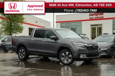 This 2019 Honda Ridgeline Touring brings together rugged capability, refined comfort, and advanced t...