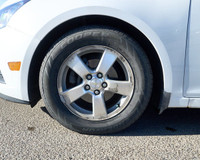 KBB.com 10 Best Sedans Under $25,000. This Chevrolet Cruze boasts a Turbocharged Gas I4 1.4L/83 engi... (image 9)