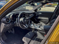 Experience the exhilarating performance of this 2023 Alfa Romeo Giulia Veloce, boasting a rare Ocra... (image 9)