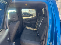 The 2023 Chevrolet Colorado 4WD LT Crew Cab in a striking blue finish offers impeccable handling wit... (image 8)
