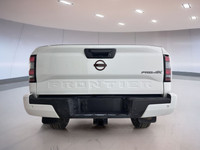 The 2023 Nissan Frontier Pro-4x, available at Moose Jaw Honda, is a robust and reliable truck design... (image 5)