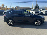 The 2021 Ford Escape Titanium AWD is a sleek and sporty compact SUV that balances style, comfort, an... (image 5)