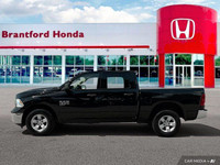 Command the road with this 2022 Ram 1500 Classic SLT Crew Cab Pickup, boasting a powerful 3.6L Penta... (image 1)