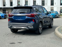 This 2023 Kia Seltos has a Blue exterior and Black seats with seating for 5. Equipped with a 1.6 L 4... (image 7)