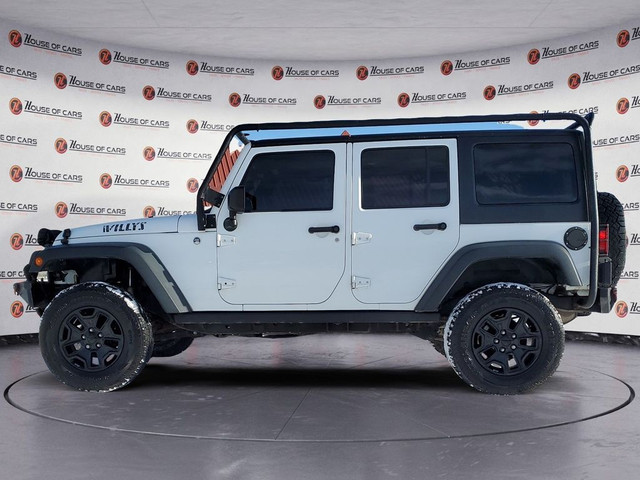  2014 Jeep WRANGLER UNLIMITED 4WD 4dr Sport in Cars & Trucks in Calgary - Image 2