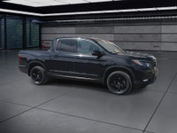 A rugged yet refined crew cab pickup with all-wheel drive and a 5.25 ft. box. The Black Edition incl... (image 1)