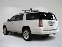 This 2016 GMC Yukon XL Denali blends commanding presence with luxurious comfort in a White finish. A... (image 4)