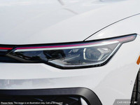 The 2025 Volkswagen Golf GTI in a striking white finish is a front-wheel-drive dynamo engineered to... (image 8)