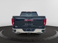 Looking for more luxury in the All New GMC Sierra? This 4WD Onyx Black Sierra SLT is a Crew Cab Pick... (image 3)