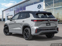 This Volkswagen Tiguan boasts a Intercooled Turbo Regular Unleaded I-4 2.0 L/121 engine powering thi... (image 4)