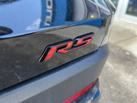 The 2025 Chevrolet Equinox RS in Mosaic Black Metallic is a stylish and sporty compact SUV. Its bold... (image 6)