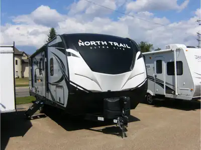 1 Large Slide, an Outdoor Kitchen, Sleeps 8 with Bunks! Call Dealership for more details on this Tra...