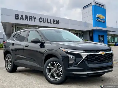 Experience the thrill of driving the new Chevrolet Trax LT in a striking black exterior with front-w...