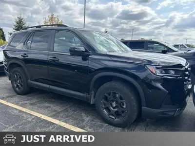 Command the road with this stunning 2025 Honda Pilot TrailSport, boasting a sleek Crystal Black Pear...
