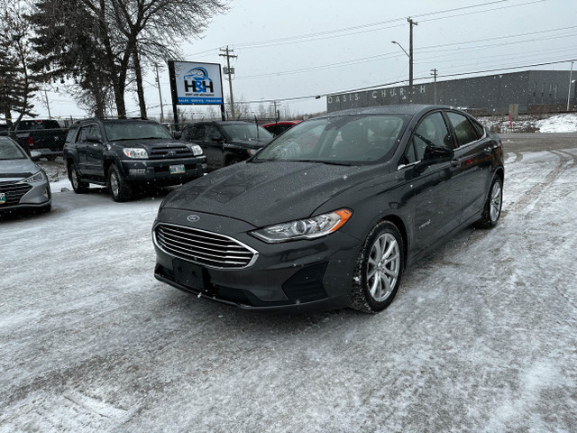 CLEAN TITLE, SAFETIED. 2019 Ford FUSION HYBRID in Cars & Trucks in Winnipeg