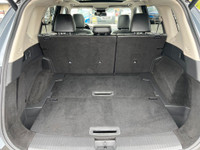 This 2021 Nissan Rogue Platinum has a Grey Exterior and Black Interior with seating for 5. Equipped... (image 6)