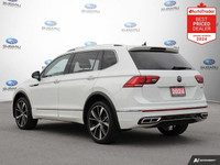 New Price! Odometer is 10773 kilometers below market average! Pure White 2024 Volkswagen Tiguan High... (image 2)