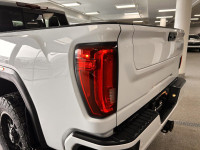 Drive our used Diesel powered 2021 GMC Sierra 2500 AT4 Crew Cab standard box 4X4 in Summit White and... (image 9)