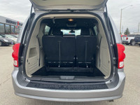 The 2019 Dodge Grand Caravan SXT Premium Plus 3.6L is a versatile minivan powered by a 3.6-liter V6... (image 4)