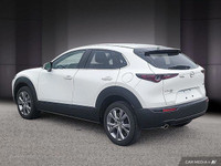 Le Mazda CX-5 GS AWD 2023 est un VUS compact qui se distingue par son design raffiné, sa conduite dy... (image 4)