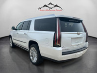 The 2016 Cadillac Escalade ESV Platinum in White combines robust 4×4 capabilities with luxurious dri... (image 2)