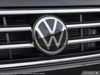 This Volkswagen Tiguan delivers a Intercooled Turbo Regular Unleaded I-4 2.0 L/121 engine powering t... (image 9)