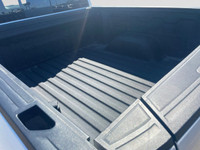 The All New GMC Sierra has been redefined from Hood to Hitch. This 4WD White Sierra is a Crew Cab Pi... (image 9)