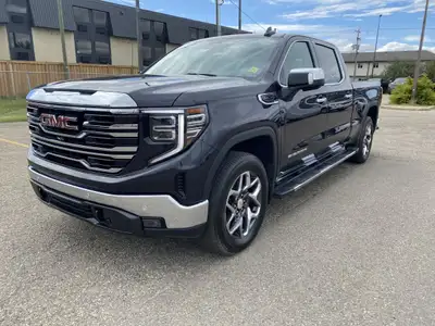 Experience the perfect blend of power and luxury with the 2023 GMC Sierra 1500 SLT, featuring a robu...