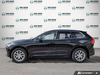 The 2021 Volvo XC60 T5 AWD Momentum is a sophisticated black SUV that offers an impeccable balance o... (image 3)
