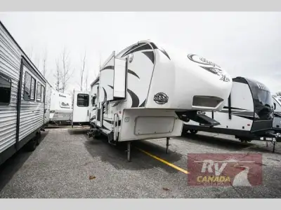 Please Call Us At 613.851.7326 with any questions? Single Slide Cougar 1/2 Ton Series Fifth Wheel by...