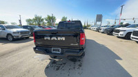 This 2025 RAM 1500 BIGHORN/LONESTAR CREW 4X4 has the following options Deluxe Cloth Bucket Seat, Rem... (image 3)