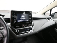 Introducing the 2021 Toyota Corolla. A sleek sedan perfect for everyday driving. Features include tr... (image 4)