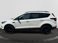 Get the NEW look for the USED price! This 4WD Ford Escape is White in color and is equipped with an... (image 1)