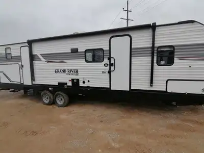Are you ready for this? The ultimate family bunkhouse with huge outdoor kitchen, separate rear bunk...