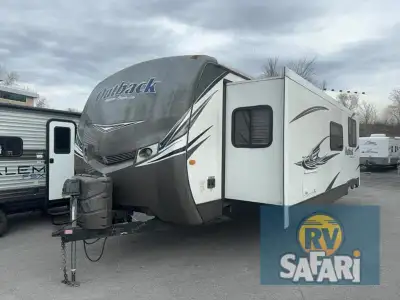 Check out this Keystone Outback travel trailer 300RB featuring a full rear bath, super large single...