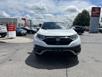 This 2021 Honda CR-V Sport SUV boasts impressive all-wheel drive capability, perfect for navigating... (image 1)