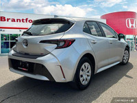 This sleek 2023 Toyota Corolla Hatchback SE in silver is ready to elevate your daily drives. Boastin... (image 5)