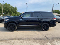 **WE WILL BEAT ANY DEALER IN THE CITY** Infinite Black Metallic Clearcoat 2023 Lincoln Navigator Res... (image 1)