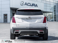 Finished in a Crystal White Tricoat exterior that complements the Black leather interior, standing o... (image 4)
