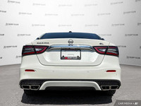 This 2023 Nissan Maxima SL boasts a stunning white exterior and luxurious interior, perfect for maki... (image 5)