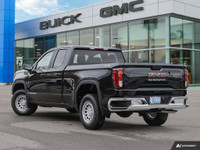 WAS: $59128 NOW: $51199 plus taxes and licensing feesA Bold Statement on the RoadSleek Black 2024 GM... (image 3)