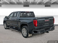 Command the road in this luxurious 2021 GMC Sierra 1500 Denali Crew Cab. This powerful truck boasts... (image 2)