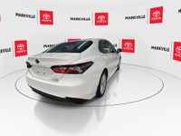 The 2024 Toyota Camry Hybrid LE is a popular and efficient mid-size sedan. It's the base trim level... (image 9)