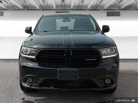 The 2018 Dodge Durango offers leather-faced bucket seats, heated front and rear seats, a heated stee... (image 8)